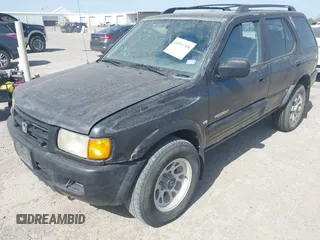 1998 Honda Passport LX with VIN 4S6CK58W7W4407105, listed as a IAAI auction lot 41831708 with 286,061 mi miles. Bid and sale history available at carsss.com. Image 6.