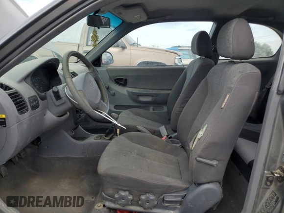 2004 Hyundai Accent GL with VIN KMHCG35C34U290855, listed as a Copart auction lot 70719664 with 176,210 mi miles and Salvage Title. Bid and sale history available at carsss.com. Image 7.