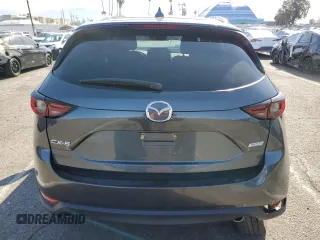 2019 Mazda CX-5 Grand Touring with VIN JM3KFADM2K0665356, listed as a Copart auction lot 51886685 with 44,760 mi miles and Salvage Title. Bid and sale history available at carsss.com. Image 6.