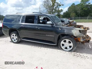 2015 Chevrolet Suburban LTZ with VIN 1GNSCKKC8FR156706, listed as a IAAI auction lot 40638221 with Not Provided miles and . Bid and sale history available at DreamBid. Image 1.
