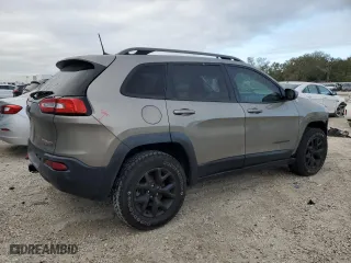 2016 Jeep Cherokee Trailhawk with VIN 1C4PJMBB8GW368502, listed as a Copart auction lot 88397305 with 108,200 mi miles and Salvage Title. Bid and sale history available at carsss.com. Image 3.