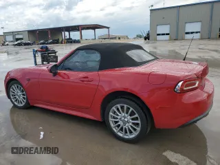 2017 FIAT 124 Spider Lusso z VIN JC1NFAEKXH0102435, wystawiony jako Copart lot #54235675 z przebiegiem 84 343 mil mil oraz Szkoda całkowita • Salvage title. Historia ofert i sprzedaży dostępna na DreamBid. Obrazek 2.