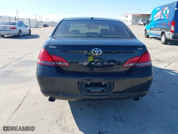 2009 Toyota Avalon XL with VIN 4T1BK36B89U335604, listed as a IAAI auction lot 41328877 with 166,396 mi miles. Bid and sale history available at carsss.com. Image 16.