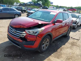 2014 Hyundai Santa Fe with VIN 5XYZT3LB1EG134837, listed as a IAAI auction lot 42454126 with 118,225 mi miles and . Bid and sale history available at DreamBid. Image 2.