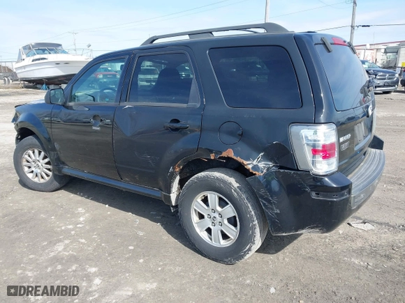 2010 Mercury Mariner with VIN 4M2CN8B79AKJ04672, listed as a IAAI auction lot 41736274 with 129,215 mi miles. Bid and sale history available at carsss.com. Image 3.