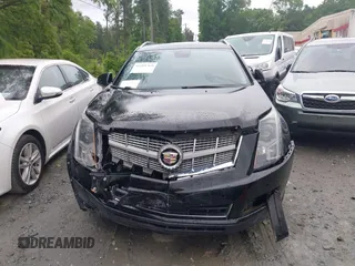 2011 Cadillac SRX Luxury Collection z VIN 3GYFNAEY0BS629344, wystawiony jako IAAI lot #42208369 z przebiegiem 198 330 mil mil oraz . Historia ofert i sprzedaży dostępna na DreamBid. Obrazek 12.