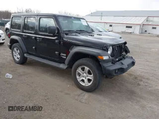 2018 Jeep Wrangler Unlimited Sport z VIN 1C4HJXDGXJW189576, wystawiony jako IAAI lot #41906106 z przebiegiem 60 463 mil mil oraz . Historia ofert i sprzedaży dostępna na DreamBid. Obrazek 1.
