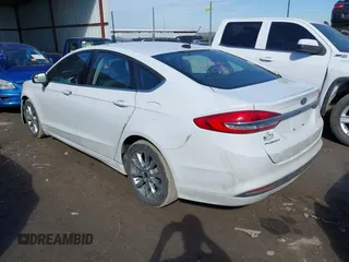 2017 Ford Fusion SE z VIN 3FA6P0H77HR277995, wystawiony jako IAAI lot #41586483 z przebiegiem 191 912 mil mil oraz . Historia ofert i sprzedaży dostępna na DreamBid. Obrazek 3.