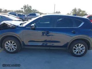 2023 Mazda CX-5 2.5 S Select Package with VIN JM3KFBBM7P0148375, listed as a IAAI auction lot 41624696 with 56,754 mi miles. Bid and sale history available at carsss.com. Image 14.
