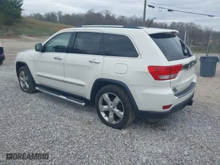 2012 Jeep Grand Cherokee Overland with VIN 1C4RJFCGXCC263065, listed as a IAAI auction lot 41942110 with 189,681 mi miles. Bid and sale history available at carsss.com. Image 3.