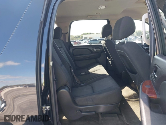 2011 Chevrolet Suburban LS with VIN 1GNSCHE04BR284777, listed as a IAAI auction lot 41291991 with 285,187 mi miles. Bid and sale history available at carsss.com. Image 8.