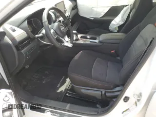 2024 Nissan Sentra SR z VIN 3N1AB8DV9RY388659, wystawiony jako Copart lot #56790005 z przebiegiem 5 354 mil mil oraz Szkoda całkowita • Salvage title. Historia ofert i sprzedaży dostępna na DreamBid. Obrazek 7.