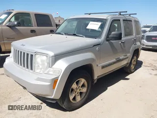 2012 Jeep Liberty Sport with VIN 1C4PJMAK1CW106039, listed as a IAAI auction lot 41810966 with 120,121 mi miles. Bid and sale history available at carsss.com. Image 2.