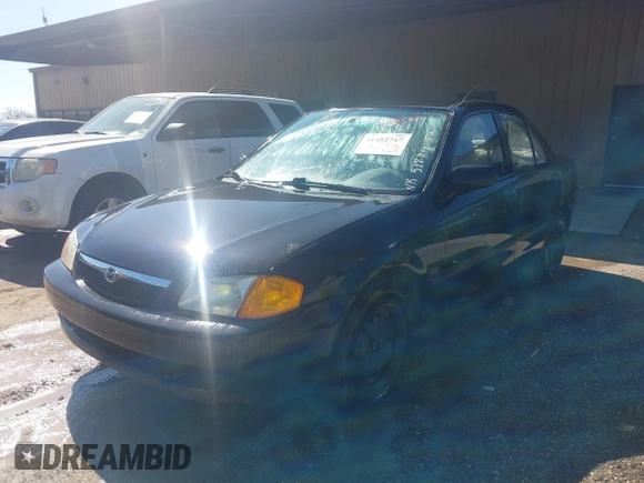 2000 Mazda Protege DX with VIN JM1BJ2227Y0303448, listed as a IAAI auction lot 41482747 with 206,542 mi miles and . Bid and sale history available at DreamBid. Image 2.
