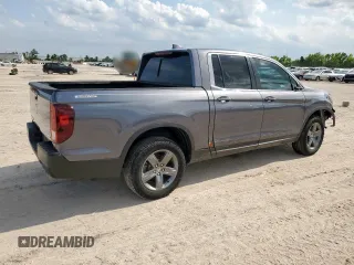 2023 Honda Ridgeline RTL z VIN 5FPYK3F54PB043289, wystawiony jako Copart lot #59173065 z przebiegiem 34 219 mil mil oraz Szkoda całkowita • Salvage title. Historia ofert i sprzedaży dostępna na DreamBid. Obrazek 3.