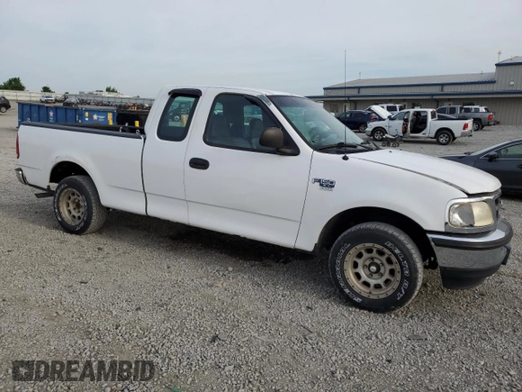 1998 Ford F-150 with VIN 1FTZX17W2WKB25677, listed as a Copart auction lot 54419145 with 319,584 mi miles and Salvage title. Bid and sale history available at DreamBid. Image 4.
