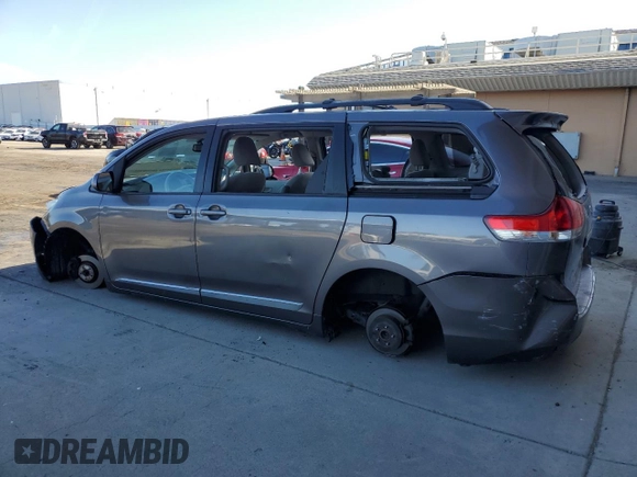 2013 Toyota Sienna LE AAS with VIN 5TDKK3DC0DS404489, listed as a Copart auction lot 56990105 with Not provided miles and Salvage title. Bid and sale history available at DreamBid. Image 2.