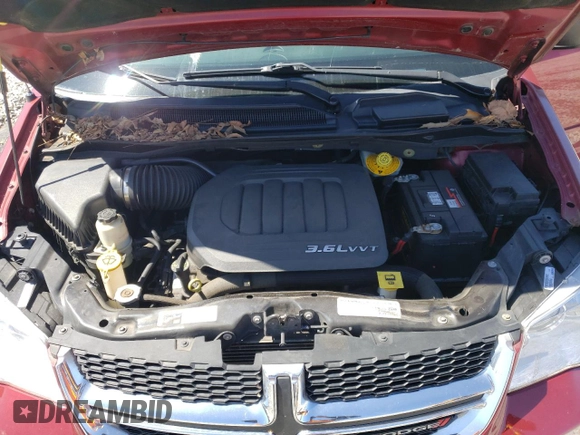 2014 Dodge Grand Caravan American Value with VIN 2C4RDGBG3ER323793, listed as a Copart auction lot 49095945 with 102,129 mi miles and Salvage Title. Bid and sale history available at DreamBid. Image 12.