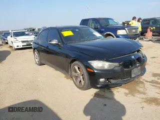 2013 BMW 3 Series 328i with VIN WBA3C1C51DF440679, listed as a IAAI auction lot 41533587 with 184,812 mi miles. Bid and sale history available at carsss.com. Image 1.