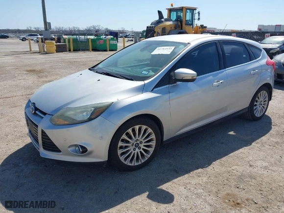 2012 Ford Focus Titanium with VIN 1FAHP3N20CL402944, listed as a IAAI auction lot 41784935 with NaN miles. Bid and sale history available at carsss.com. Image 2.