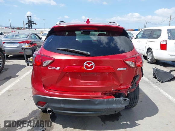 2015 Mazda CX-5 Grand Touring with VIN JM3KE2DY7F0537017, listed as a IAAI auction lot 41953011 with 78,098 mi miles. Bid and sale history available at carsss.com. Image 16.