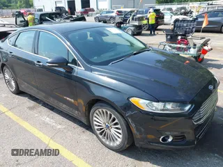 2013 Ford Fusion Titanium Hybrid with VIN 3FA6P0RU5DR322818, listed as a IAAI auction lot 42771707 with 201,018 mi miles and . Bid and sale history available at DreamBid. Image 1.