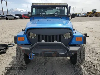 2002 Jeep Wrangler Sport with VIN 1J4FA49S32P762794, listed as a Copart auction lot 52132955 with 243,499 mi miles and Salvage Title. Bid and sale history available at carsss.com. Image 5.