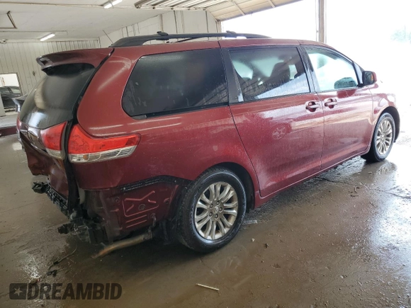 2011 Toyota Sienna XLE AAS with VIN 5TDYK3DC8BS024209, listed as a Copart auction lot 58923715 with 134,051 mi miles and Salvage title. Bid and sale history available at DreamBid. Image 3.