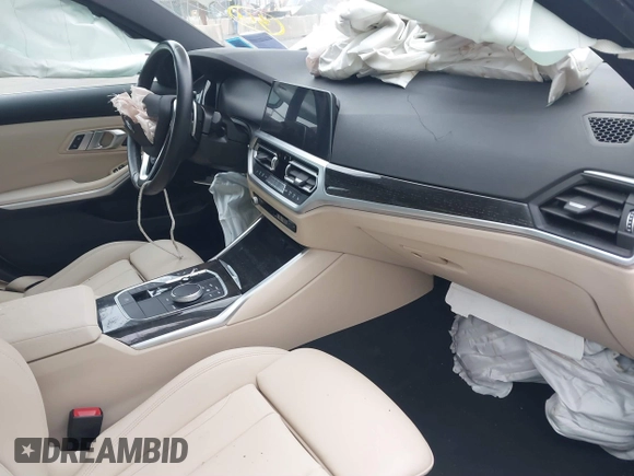 2021 BMW 3 Series 330i xDrive with VIN 3MW5R7J03M8B65004, listed as a IAAI auction lot 41244134 with Not Provided miles and . Bid and sale history available at DreamBid. Image 5.