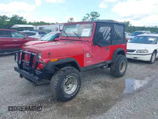 1991 Jeep Wrangler with VIN 2J4FY19P7MJ132895, listed as a IAAI auction lot 42541973 with 169,999 mi miles and . Bid and sale history available at DreamBid. Image 2.
