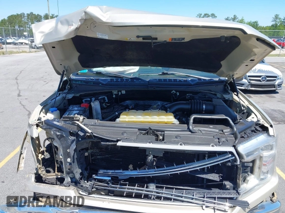 2018 Ford F-150 XL with VIN 1FTEW1E54JFE36153, listed as a IAAI auction lot 42193233 with 96,074 mi miles and . Bid and sale history available at DreamBid. Image 10.