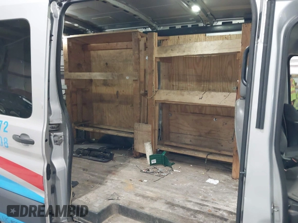 2015 Ford Transit Cargo with VIN 1FTNR1CM6FKA19083, listed as a IAAI auction lot 41790045 with 56,762 mi miles and . Bid and sale history available at carsss.com. Image 8.