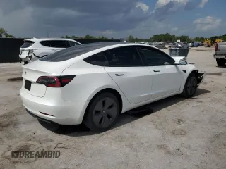 2023 Tesla Model 3 with VIN 5YJ3E1EA8PF499535, listed as a Copart auction lot 59974115 with 18,365 mi miles and Salvage title. Bid and sale history available at DreamBid. Image 3.
