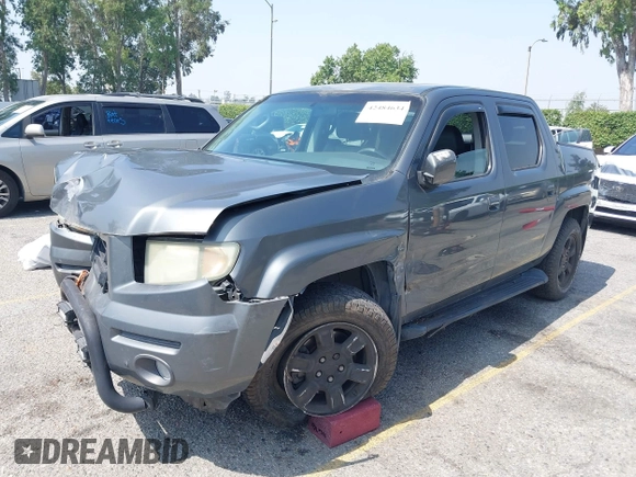 2007 Honda Ridgeline RTL with VIN 2HJYK16547H502601, listed as a IAAI auction lot 42484634 with 197,253 mi miles and . Bid and sale history available at DreamBid. Image 2.