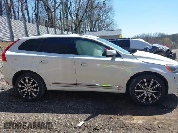 2014 Volvo XC60 R-Design Premier Plus with VIN YV4902DZ8E2545061, listed as a IAAI auction lot 42071863 with 90,718 mi miles and . Bid and sale history available at DreamBid. Image 14.