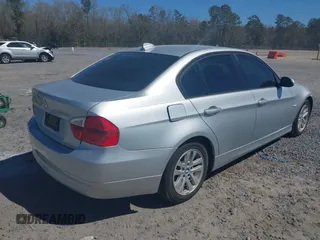 2007 BMW 3 Series 328i with VIN WBAVA33597PV64448, listed as a IAAI auction lot 41874952 with 203,284 mi miles. Bid and sale history available at carsss.com. Image 4.