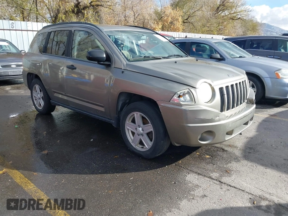 2007 Jeep Compass Sport with VIN 1J8FF47W37D325148, listed as a IAAI auction lot 40962150 with 198,345 mi miles. Bid and sale history available at carsss.com. Image 1.