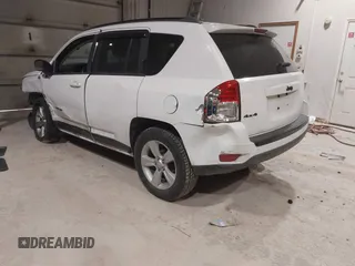 2012 Jeep Compass Latitude with VIN 1C4NJDEB0CD676725, listed as a IAAI auction lot 41948874 with 143,833 mi miles. Bid and sale history available at carsss.com. Image 3.