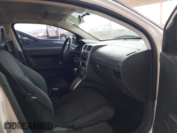 2008 Dodge Caliber SE with VIN 1B3HB28B38D656519, listed as a IAAI auction lot 42152064 with 209,292 mi miles. Bid and sale history available at carsss.com. Image 5.