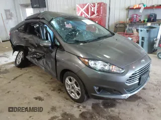 2014 Ford Fiesta SE with VIN 3FADP4BJ9EM117175, listed as a IAAI auction lot 41737432 with 156,141 mi miles. Bid and sale history available at carsss.com. Image 1.