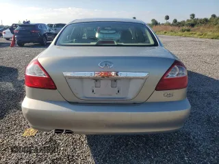 2003 Infiniti Q45 z VIN JNKBF01A93M103010, wystawiony jako Copart lot #74080224 z przebiegiem 46 898 mil mil oraz Szkody całkowita. Historia ofert i sprzedaży dostępna na DreamBid. Obrazek 6.