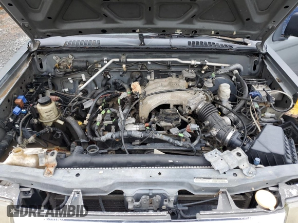 2000 Nissan Frontier XE with VIN 1N6ED27T2YC311037, listed as a Copart auction lot 57901285 with Not provided miles and Salvage title. Bid and sale history available at DreamBid. Image 11.