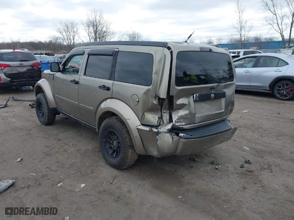 2007 Dodge Nitro SLT with VIN 1D8GU58K97W700047, listed as a IAAI auction lot 41805822 with 186,604 mi miles. Bid and sale history available at carsss.com. Image 3.