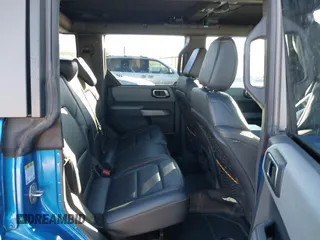 2022 Ford Bronco z VIN 1FMEE5DPXNLB37346, wystawiony jako IAAI lot #41346731 z przebiegiem 20 709 mil mil oraz . Historia ofert i sprzedaży dostępna na DreamBid. Obrazek 8.