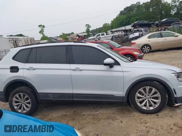 2018 Volkswagen Tiguan S with VIN 3VV1B7AX0JM041120, listed as a IAAI auction lot 42219662 with 160,852 mi miles and . Bid and sale history available at DreamBid. Image 13.
