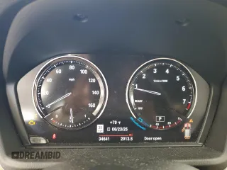 2021 BMW X1 xDrive28i with VIN WBXJG9C00M5S35249, listed as a Copart auction lot 61895775 with 34,641 mi miles and Salvage title. Bid and sale history available at DreamBid. Image 9.