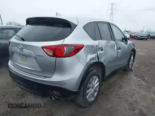 2016 Mazda CX-5 Sport with VIN JM3KE2BY5G0647715, listed as a IAAI auction lot 41831228 with 89,689 mi miles and . Bid and sale history available at carsss.com. Image 4.