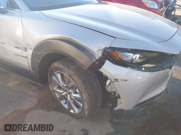 2024 Mazda CX-30 S Premium with VIN 3MVDMBDM9RM628162, listed as a IAAI auction lot 41262359 with 30,392 mi miles and . Bid and sale history available at DreamBid. Image 6.