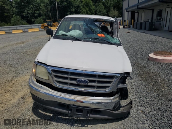 2002 Ford F-150 XL with VIN 1FTRF17282NB09380, listed as a Copart auction lot 62017964 with 0 mi miles and Salvage Title. Bid and sale history available at carsss.com. Image 5.