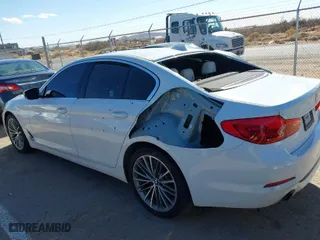 2019 BMW 5 Series 530i with VIN WBAJA5C55KWW41678, listed as a IAAI auction lot 41410453 with 89,756 mi miles. Bid and sale history available at carsss.com. Image 14.